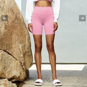 Worn Twice - Alo Yoga baby pink biker shorts - matching pink hoodie in profile!
